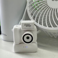 White Camera + Attached Battery